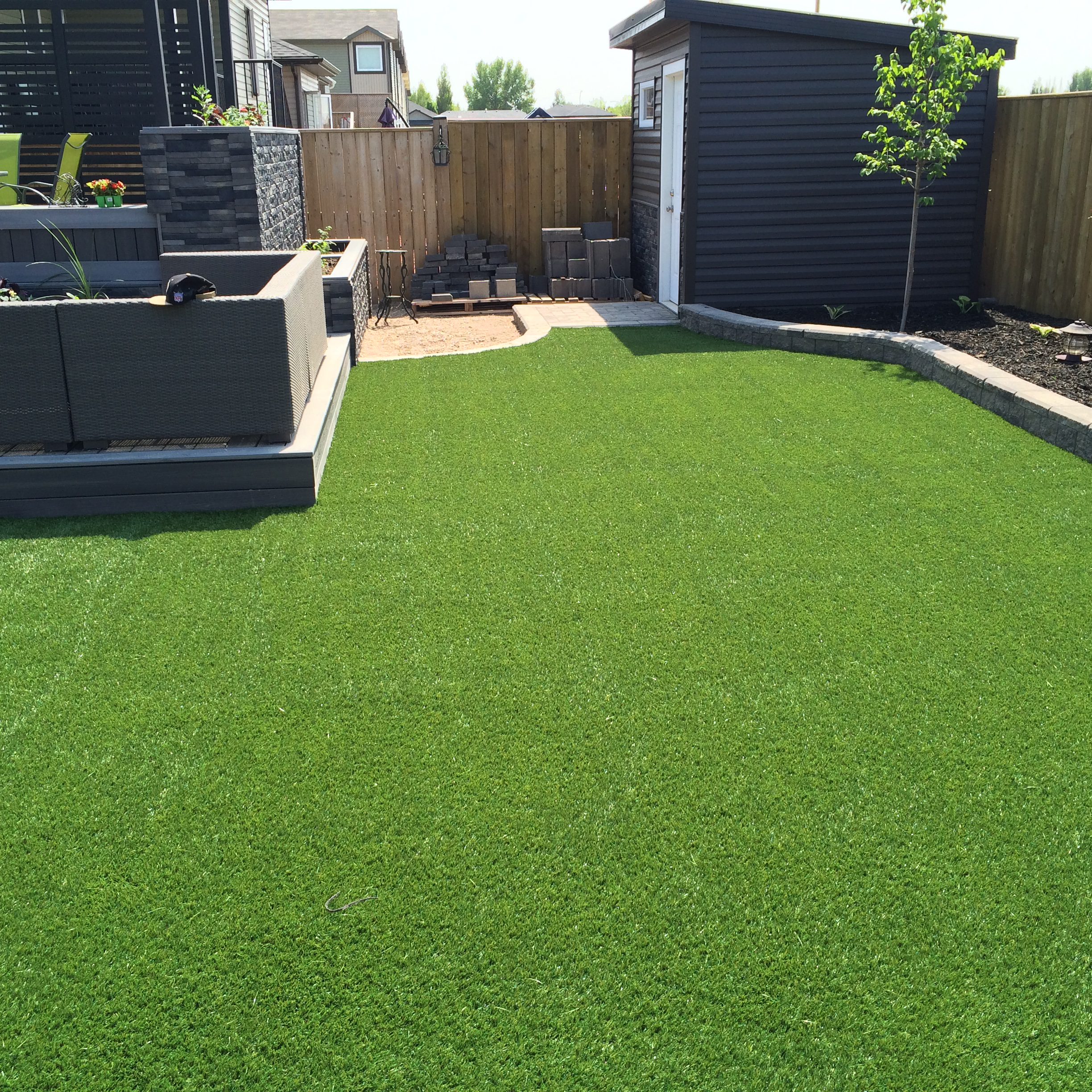 synthetic_turf_courtyard4-1024x1024-640x480 Landscaping Saskatoon brick turf project